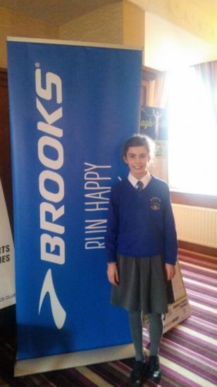 Ella represents St Jarlath's at Armagh Road Race launch