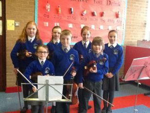 SELB fiddle group entertain whole school.